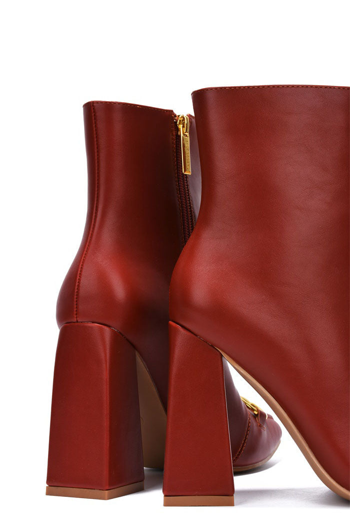 Runway Gold Horse Bit Block Heel Ankle Boots