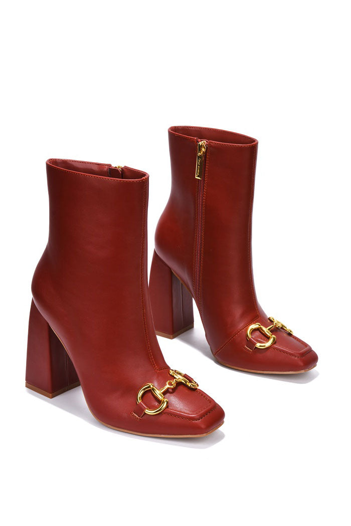 Runway Gold Horse Bit Block Heel Ankle Boots