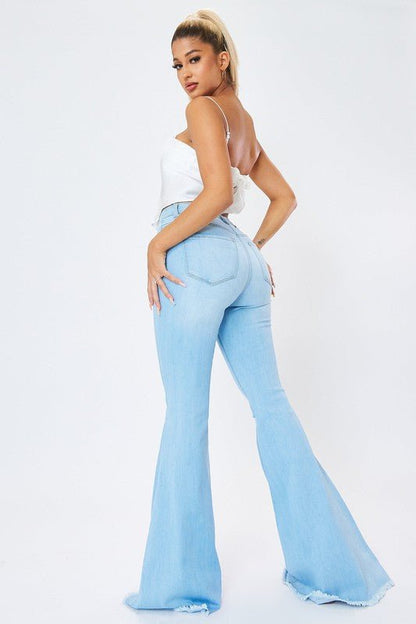 Curves Ahead High Rise Distressed Flare Jeans - ShopRbls