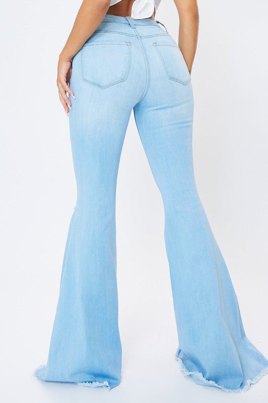 Curves Ahead High Rise Distressed Flare Jeans - ShopRbls